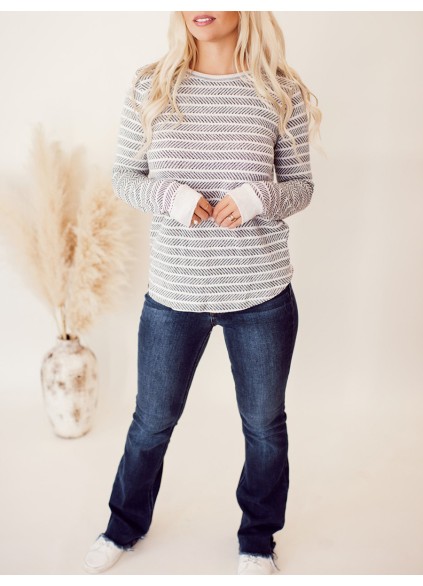 Ivory and dark gray herringbone pattern knitted sweater