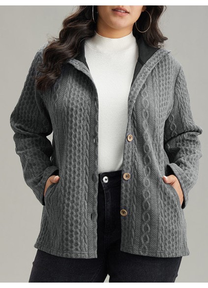 The gray textured jacket has pockets