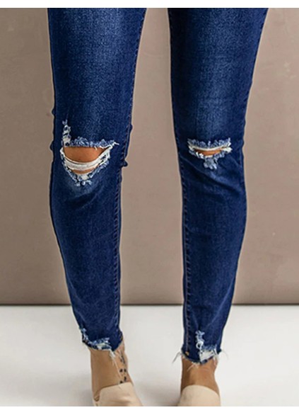 Women's ripped slim fit button jeans