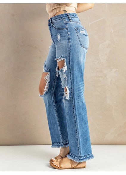 Women's washed ripped fringed jeans